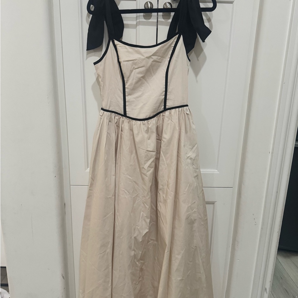 Elegant Cream Dress with Black Accents